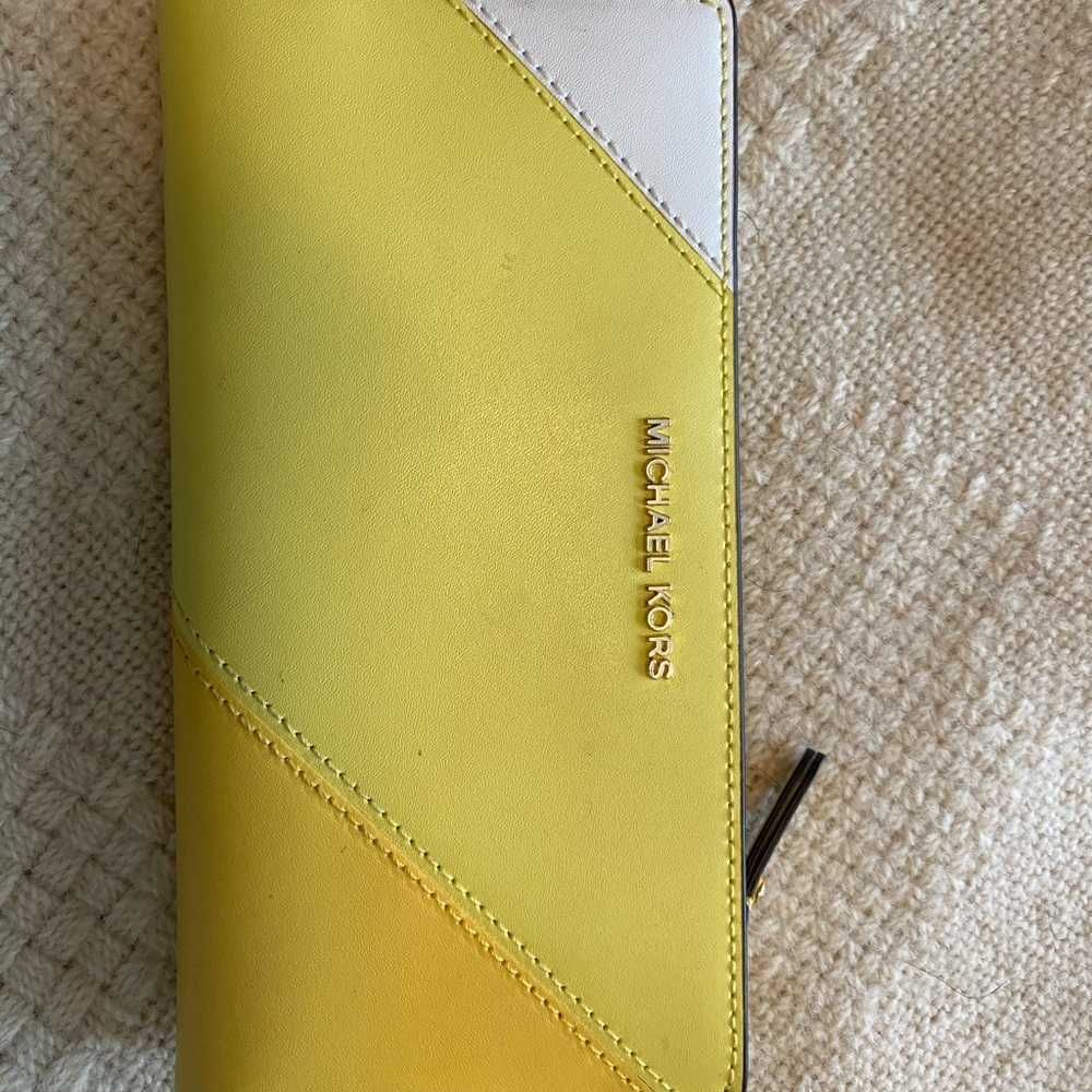 Yellow Michael Kors envelope wallet